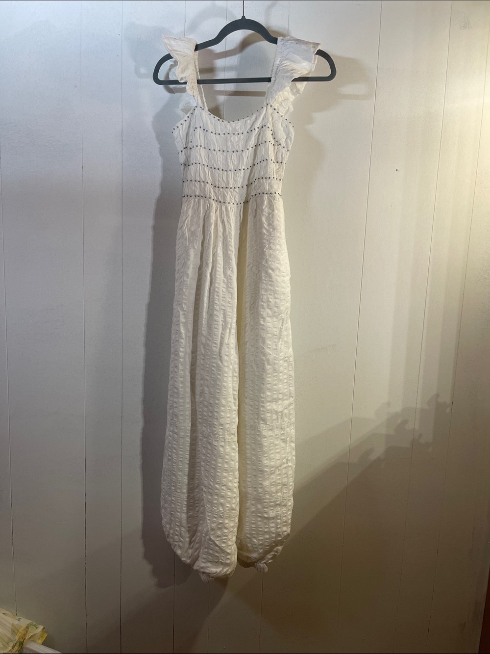 White Textured romper with Ruffled Straps
